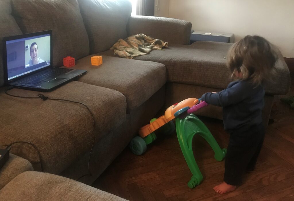 Allysha Capps' son Patrick playing with a toy during a virtual therapy session