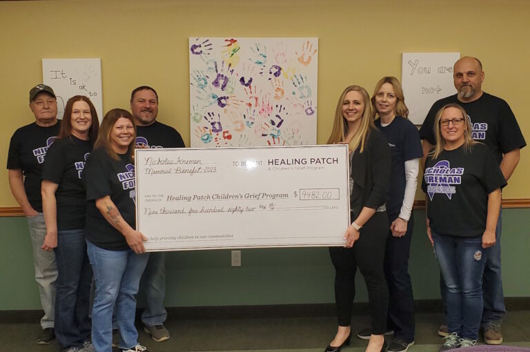 presenting the jumbo check from the nicholas foreman memorial benefit