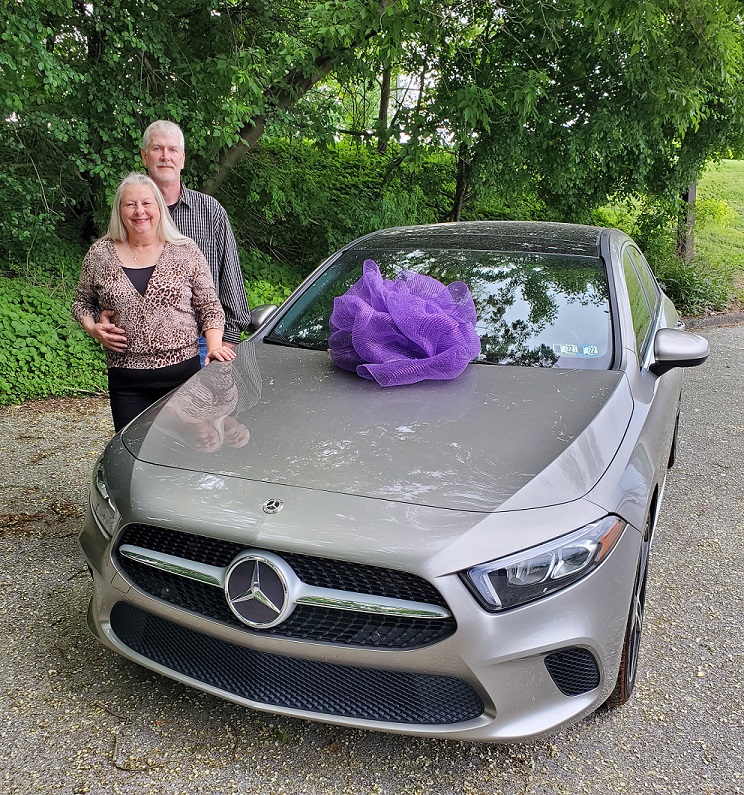 Charlotte & Paul Pletcher with their new mercedes